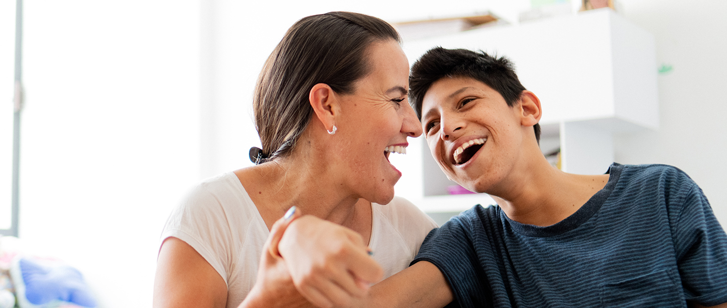 An adult giving care to an individual with a disability